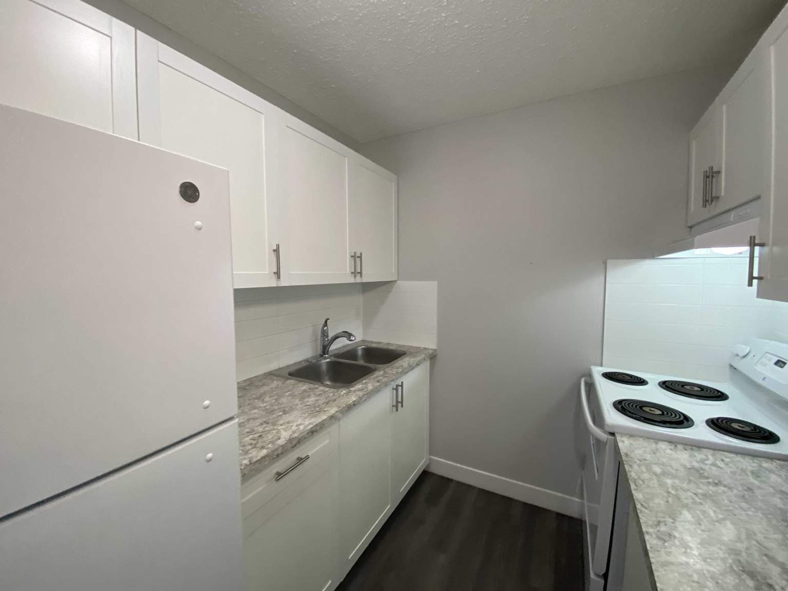 Queen's Park Townhomes — 2 bedroom - Photo 4