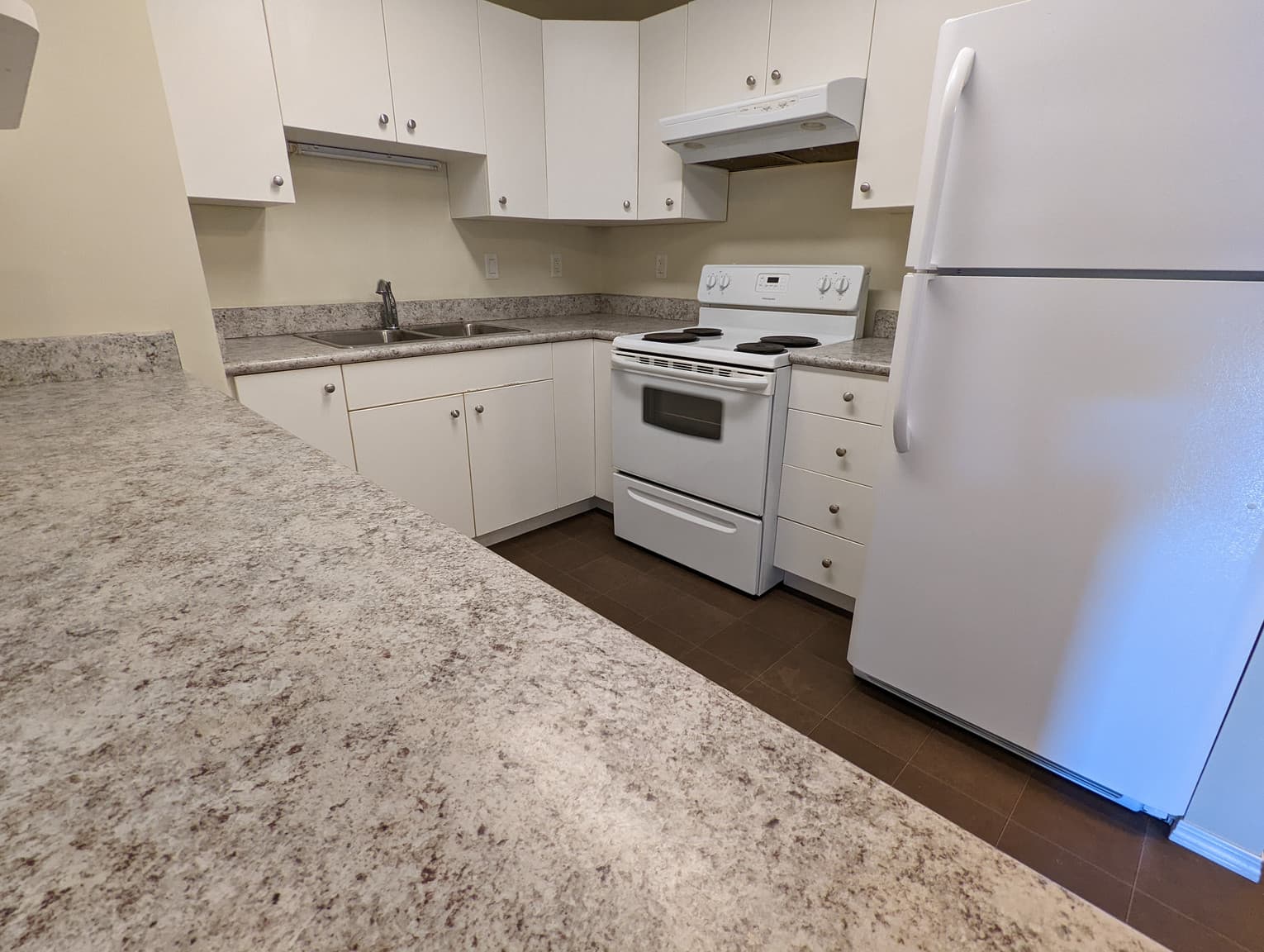 Regina Court Apartments — 2 Bedroom - Photo 2