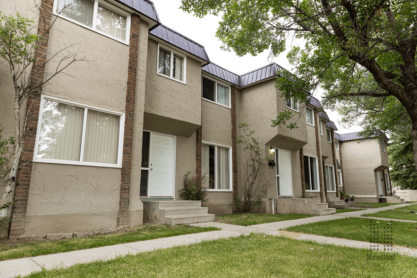 University Townhomes — 3 Bedroom - Photo 2