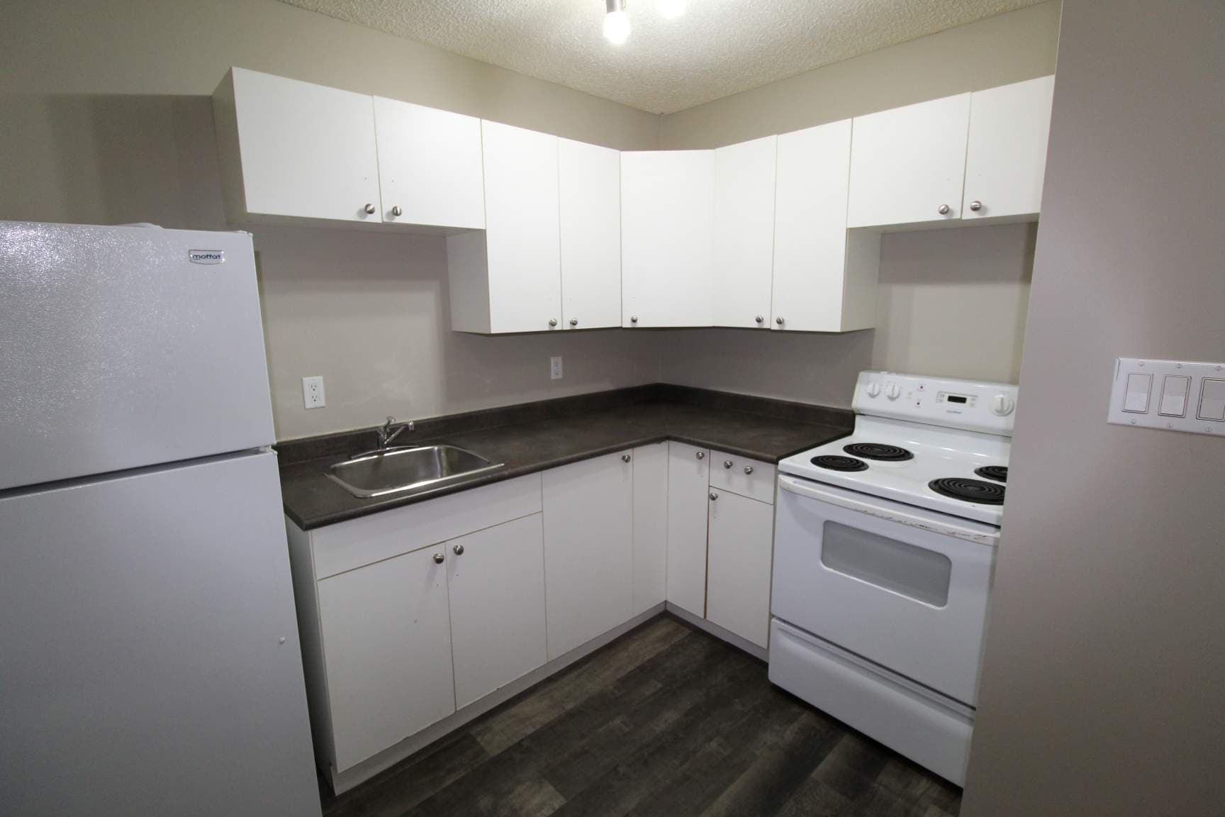 Gemini Apartments - Photo 4