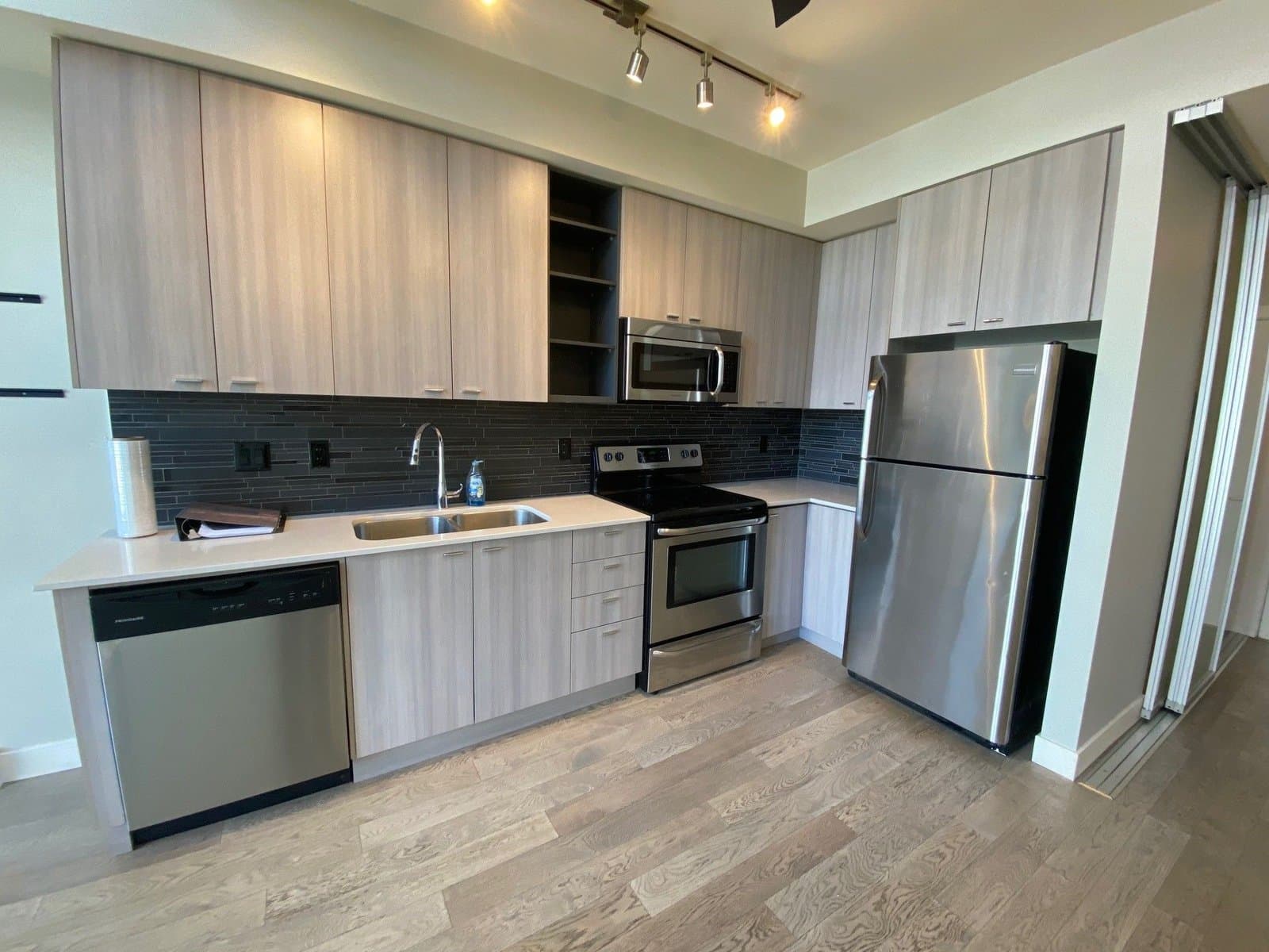 Bright Corner Condo with 2 Parking — 309 - Photo 1